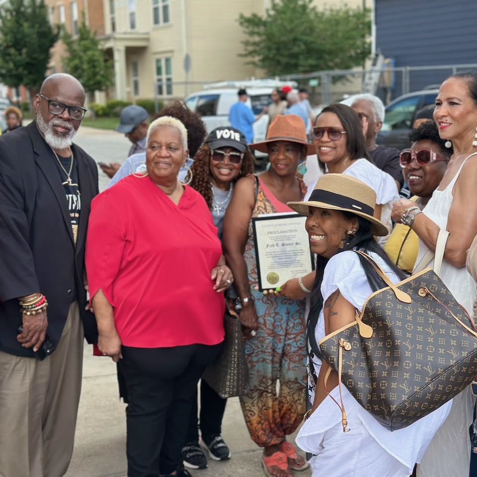 Family and friends gathered with the Fred T. Stoner Sr. proclamation