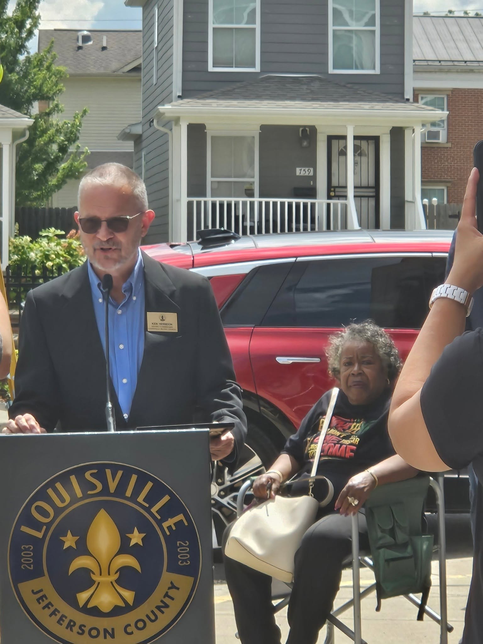Councilman speaking at the Louisville Metro podium